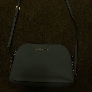 Michael Kors Black Crossbody Bag with Sleek Silhouette
